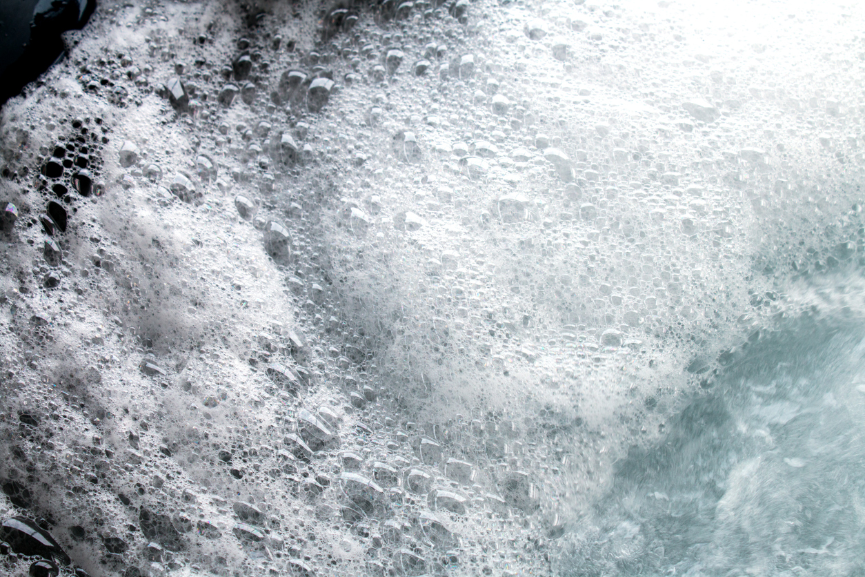 Foamy hot tub water caused by soap residue and body oils in the jets